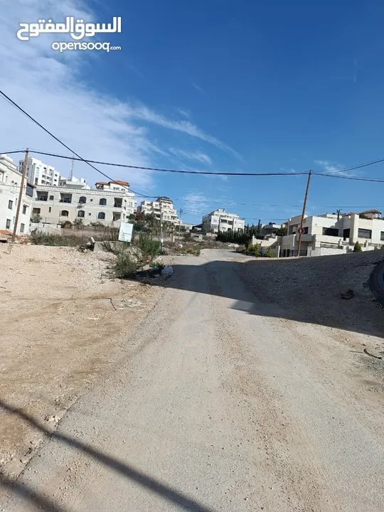 قطعة ارض بالقرب من جامع الزاوياني على شارع 12 متر