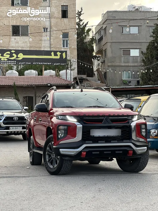 ميتسوبيشي L200 2022 فحص كامل وله ملاحضه جلد ودفلك لون مميز الله يبارك لصاحب النصيب