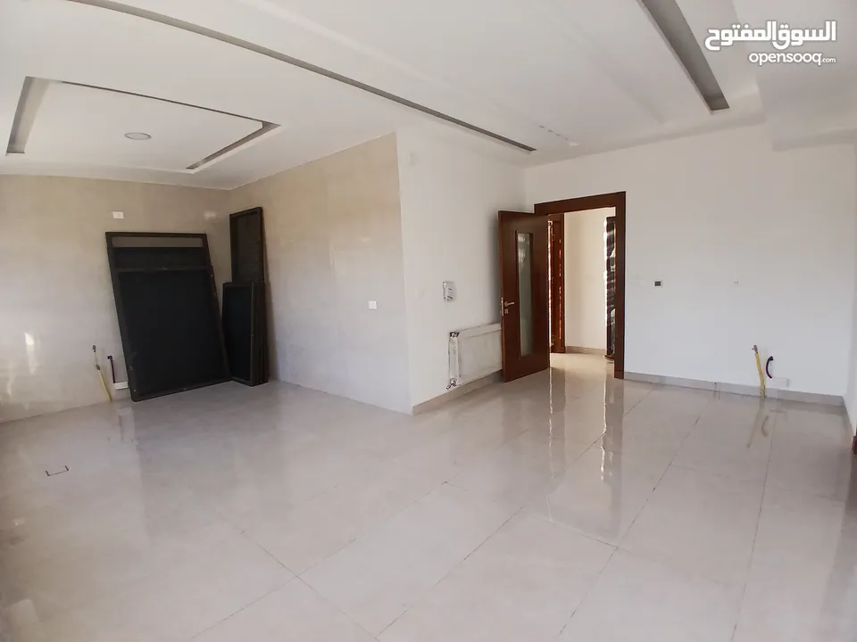 شقة دوبلكس للبيع في ضاحية الامير راشد جديدة لم تسكن