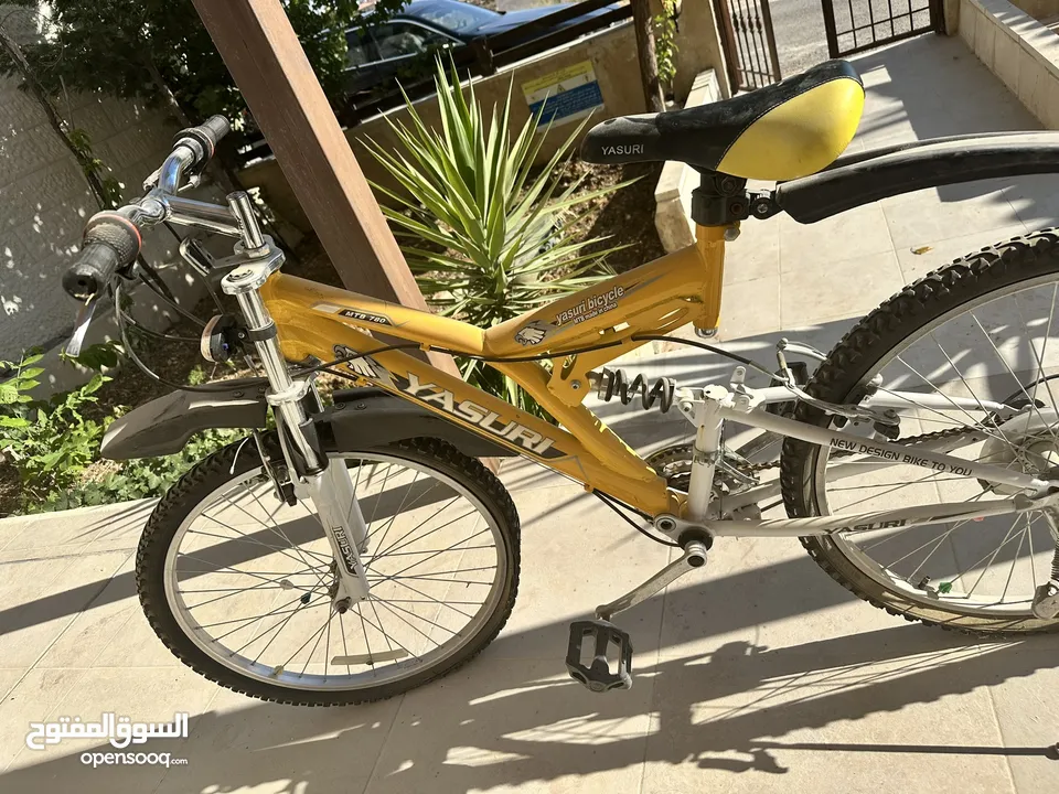 دراجة هوائية YASURI MTB 780 للبيع مع هدية ( حامل دراجة للسيارة)