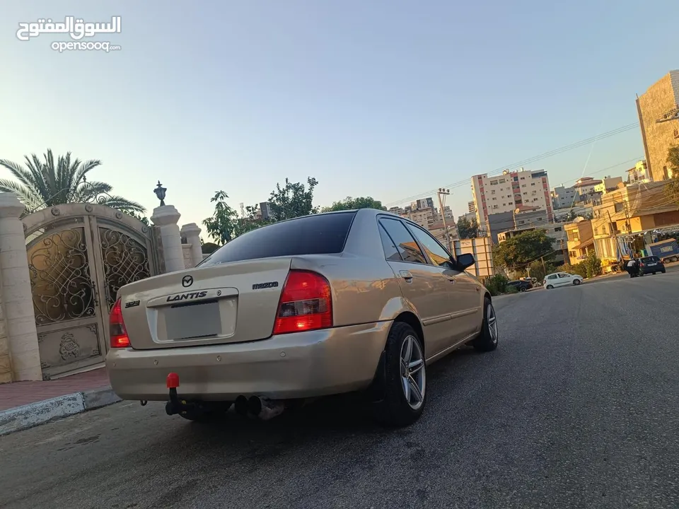 مازدا 323 اتماتك فتحه اصليه تحفه بمعنا الكلمه بسعر حرق 29500 ألف نقدا بدل وارد فحص نخب