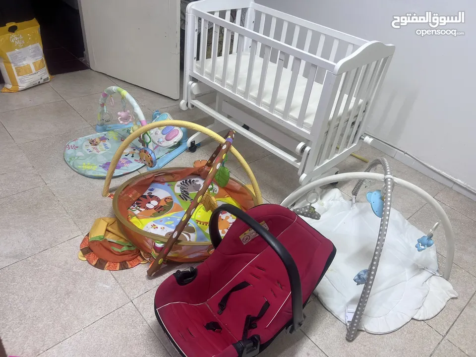 Baby bed with mattress and baby toys all 110 very clean