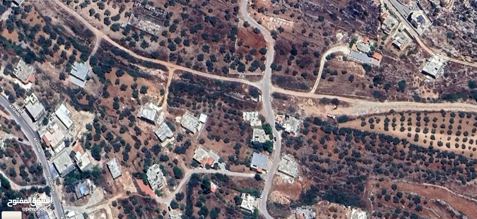 ارض طابو تقع في قراوة بني زيد مع بناء قائم عظم ضمن الارض