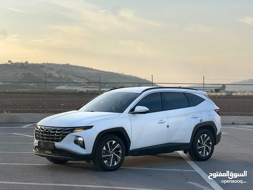 هونداي توسان /2022 فل الفل بدون فتحة سقف  2x4 ///240Hp بنزين + كهرباء  ( Haybrid) 1600cc