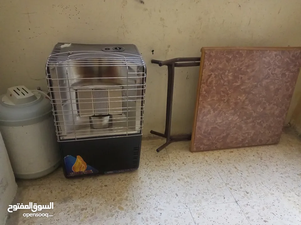 طاوله بحالة الوكاله وصوبة غاز شغاله وكيزر غير معروف عطله للبيع