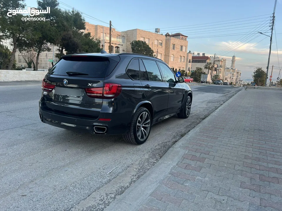 بي ام دبليو X5 بلج ان وارد وكاله عمان  فل كامل فحص كامل بحاله الوكاله دهان الشركه