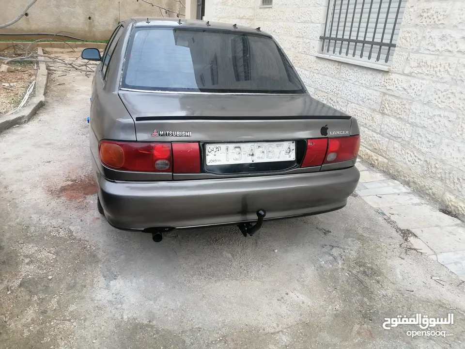 بسطار نمرة 39 + سياره ميتسوبيشي لانسر 1992 للبيع