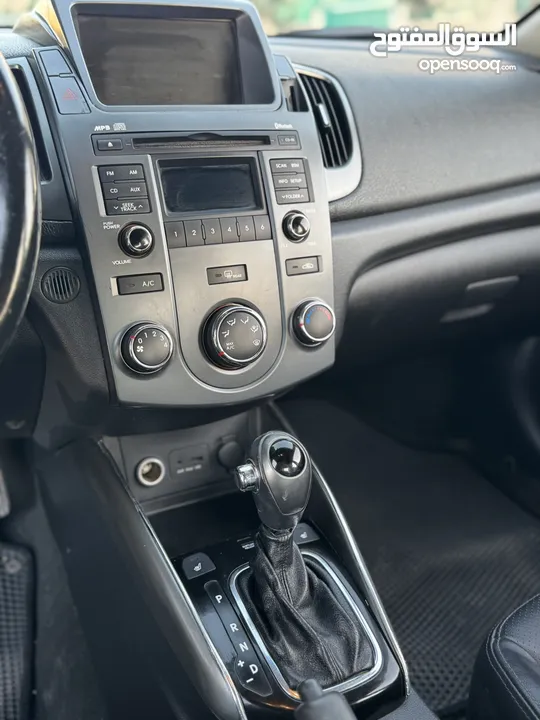 كيا فورتي للبيع بحالة ممتازه  Kia Forte 2013 لون اسود فحص كامل