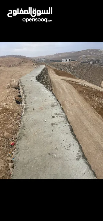 قطع (طابو)  مطلة على شارع المية(ممر عمان التنموي) وادي العش من المالك