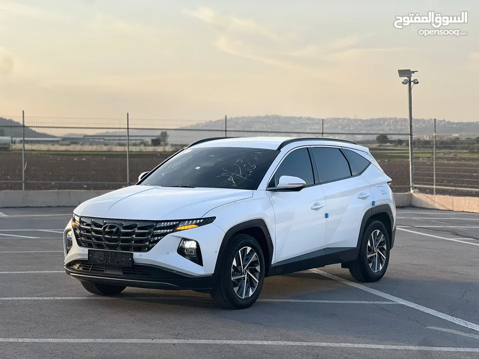 هونداي توسان /2022 فل الفل بدون فتحة سقف  2x4 ///240Hp بنزين + كهرباء  ( Haybrid) 1600cc