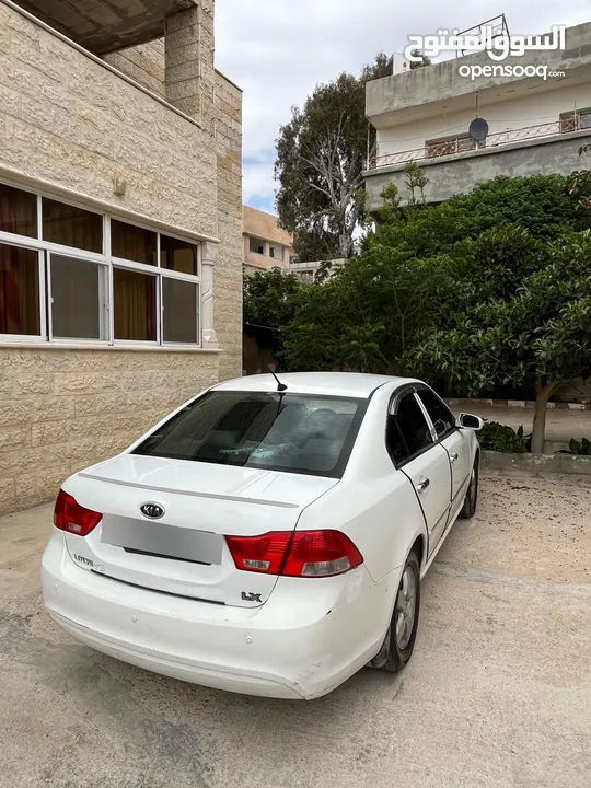 كيا اوبتما لوتسي 2009 لون ابيض بحالة جيدة جدا