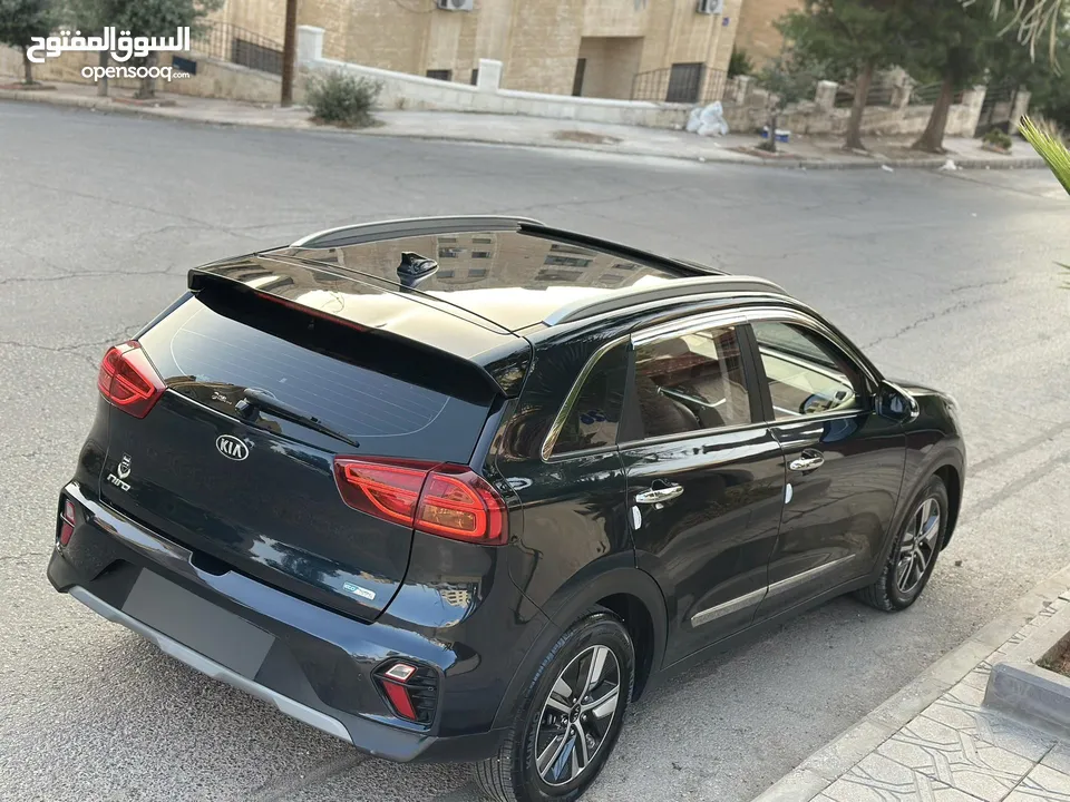 كيا نيرو هايبرد 2020 تورنج فل الفل كاش او اقساط غرفه مميزه لون خمري فتحه