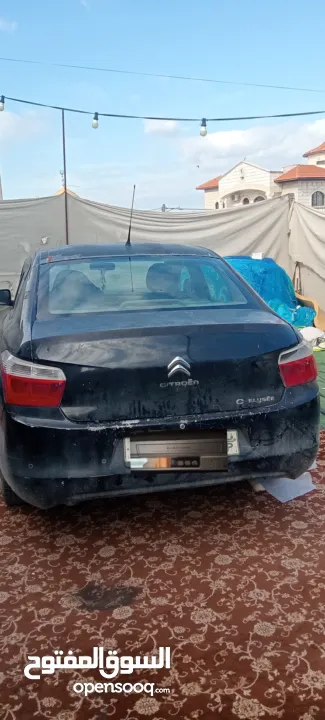 للبيع بسعر مغري جدا جدا ستروين اليزية يد اولى المالك الاول بالرخصه لون اسود دهان شركه خدوش عادية ب