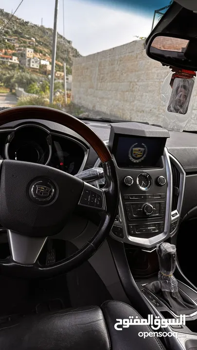 كاديلاك srx 2010 للبيع او بدل على سيارة صغيرة