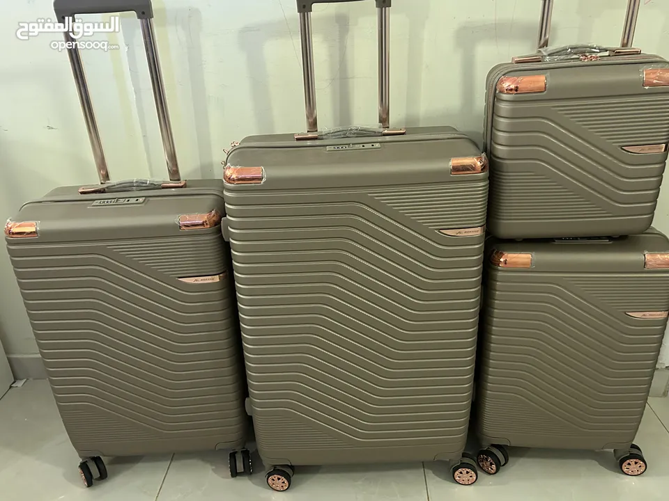 4 piece Travel bags Morano Rose gold bags - Medinah only