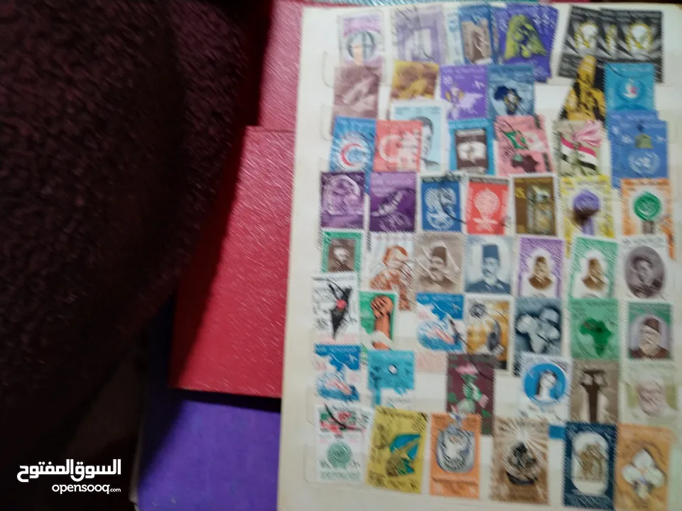 نيشان ملكى وزن41, 41 جرام من الدهب والفضه وعقدفضه من الاحجار الكريمه وطوابع قديمه نادره