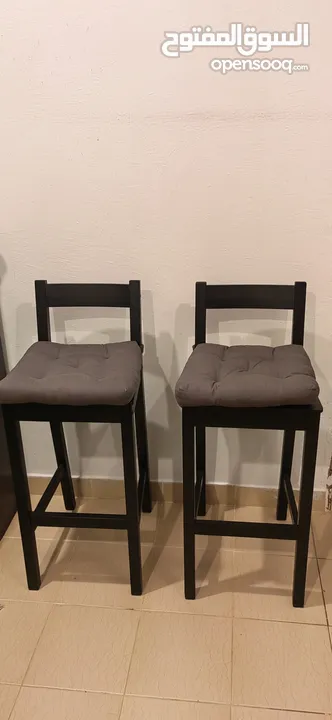 2 Black high chairs with cushions