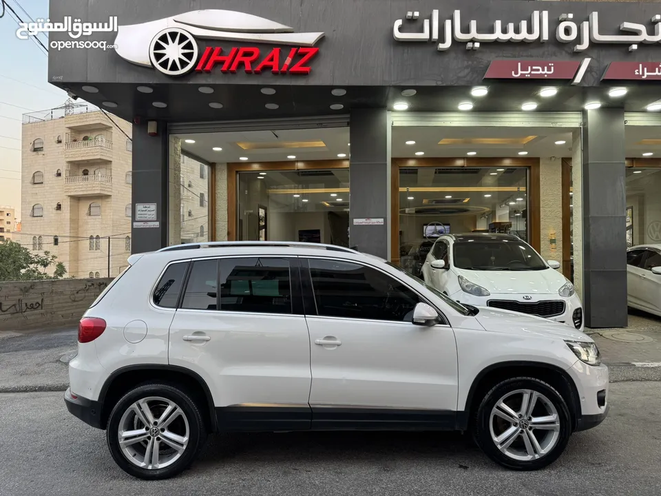 فوكس فاجن تيجوان 2012 بنزين متور 2000 تيربو 4x4 فتحة سقف بانوراما فرش بني مميز عداد قليل فحص ممتاز