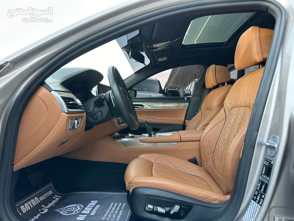 بي ام دبليو  750Li XDrive ذهبي داخل زعفراني خليجي