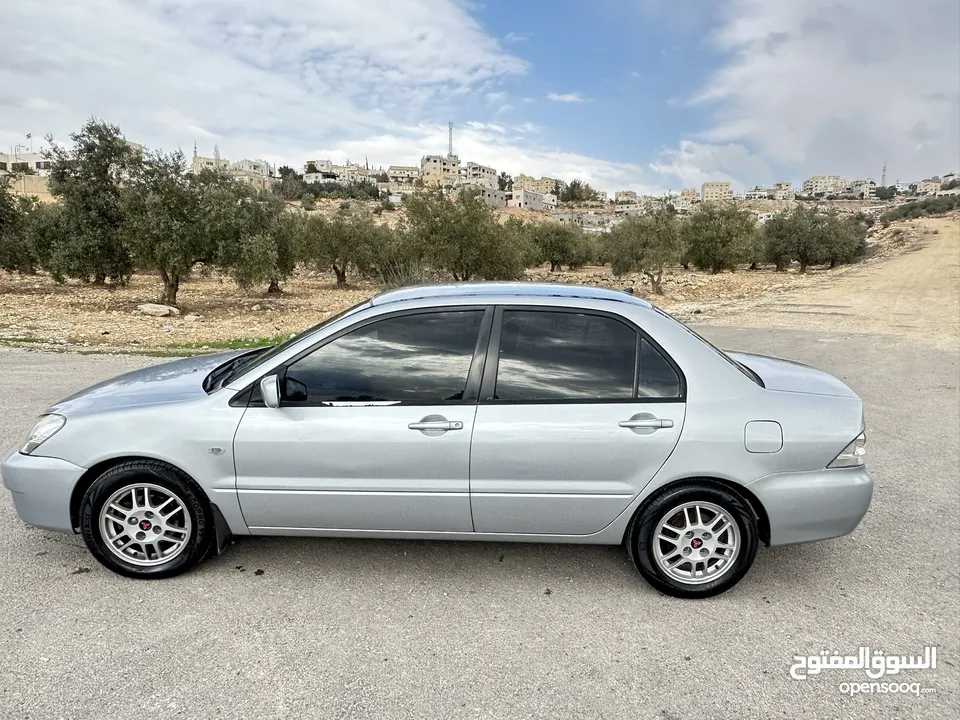 ميتسوبيشي لانسر 2007 ماتور 16 اتوماتيك  / وارد الكويت فحص كامل / كاش أو اقساط