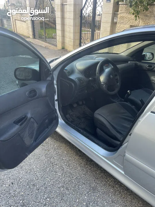 بيجو 206جيرعادي