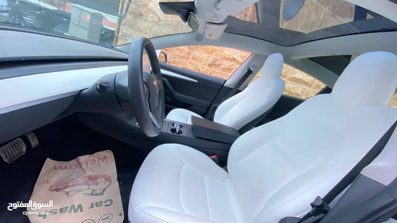 Tesla model 3 2023 standard plus ابيض