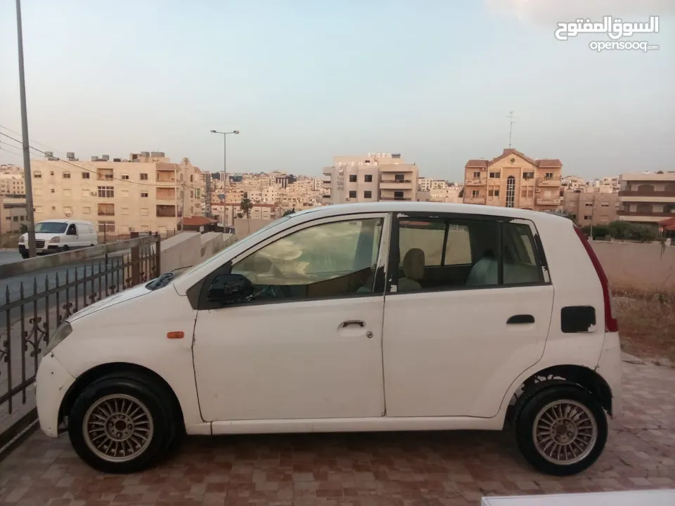 دايهاتسو شاريد 2006