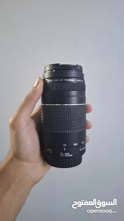عدسة كانون 75-300 وعدسة كانون yongnuo 50 فتحة 1.8 اسعار + 2 هود فتحة 52. الاسعار فيها مجال