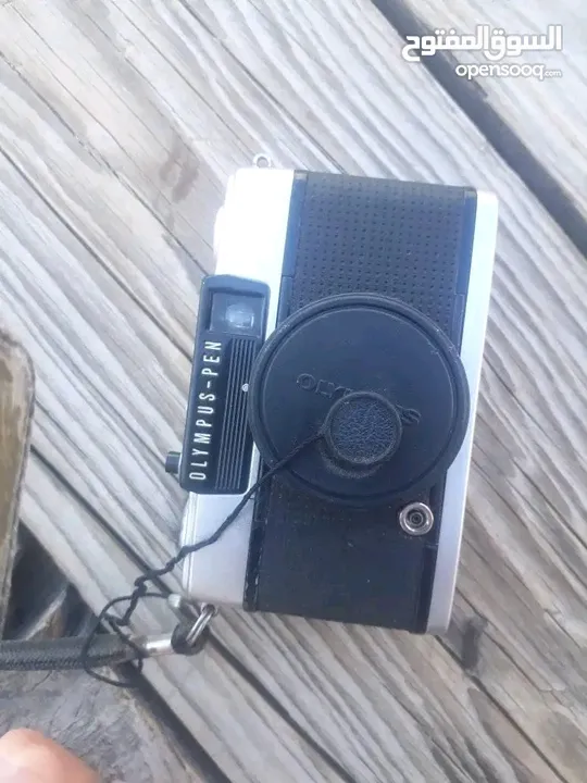 polarid sx70 & OLYMPUS & KODAK DISC