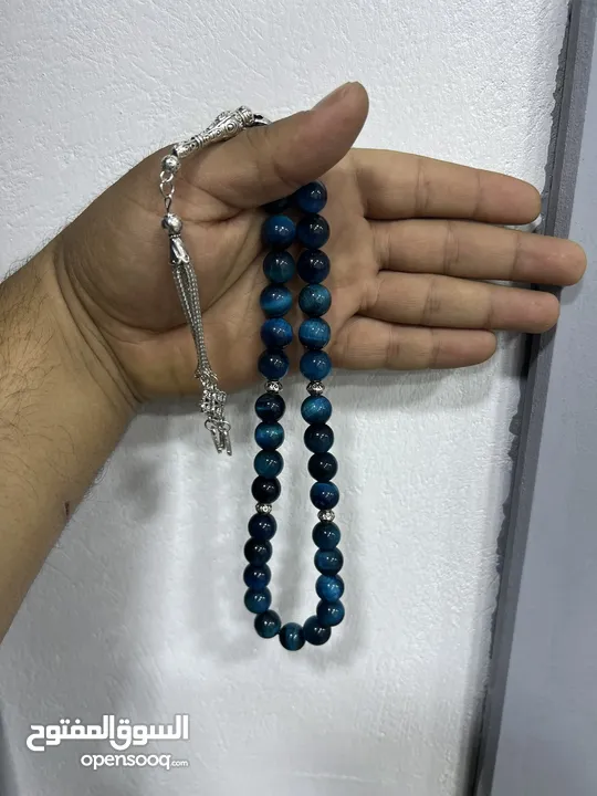 عرض خاص سبحه عين النمر ازرق او ذهبي بسعر حرق 33 حبة حلوة مش صغيرة للعلم مع طقم انتيومون مرتب