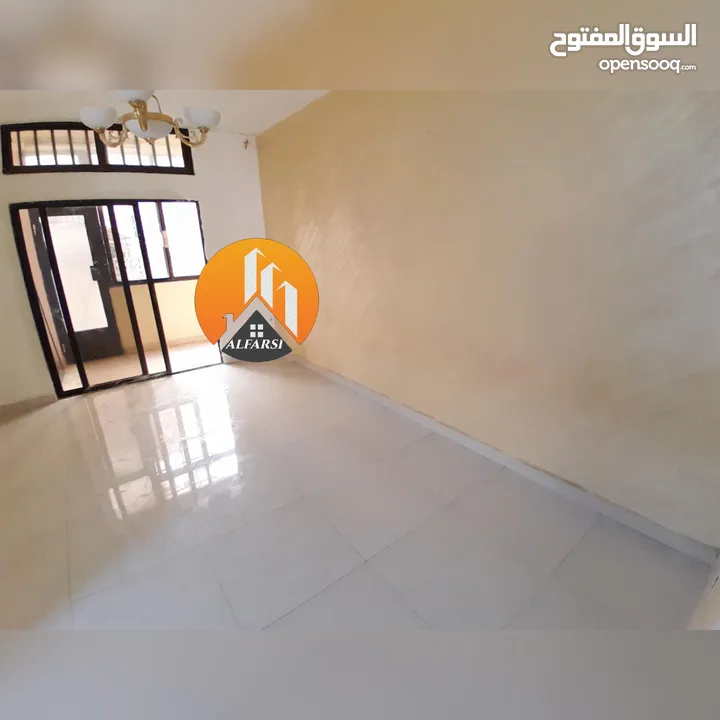 شقة ارضية مستقلة في ضاحية الامير حسن مع تراس امامي وساحات تصلح سكن عائلي او جمعية او عيادة اجار مغري