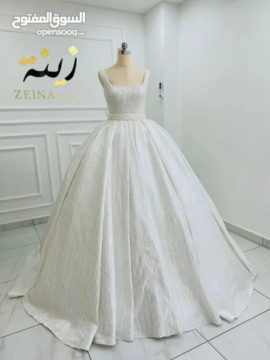 شروة مجموعة من بدل الابيض و الملون و فساتين السهرة