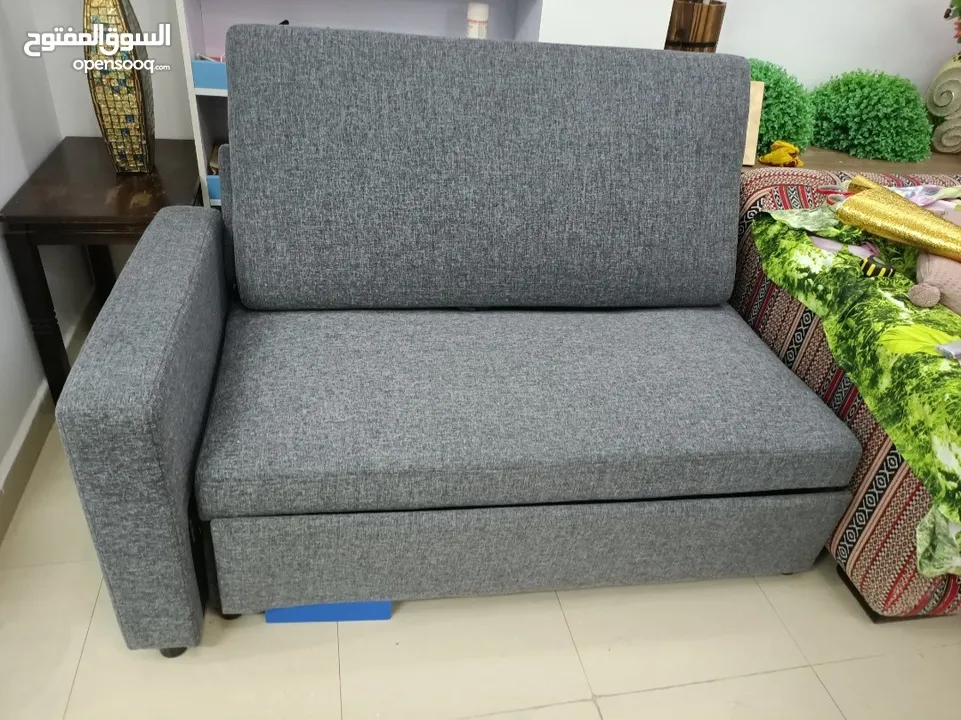 Fabric Sofa bed potable in excellent condition for urgent sale.