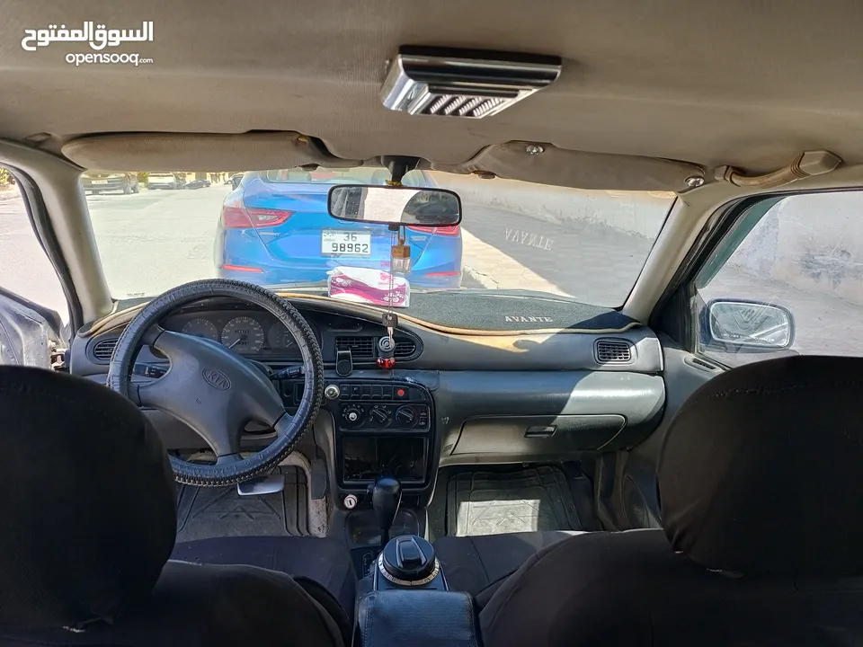 كيا سيفيا ون لون كحلي موديل 95 للبيع