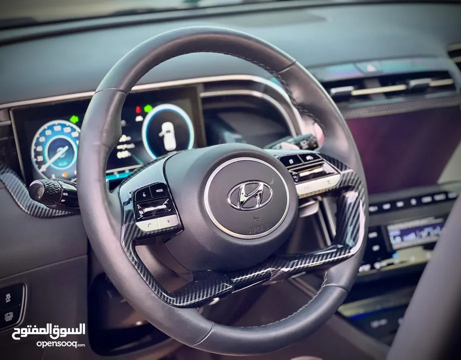 هونداي توسان/2022 فل الفل فتحة سقف بانوراما  2x4 ///240Hp بنزين + كهرباء  ( Haybrid) 1600cc