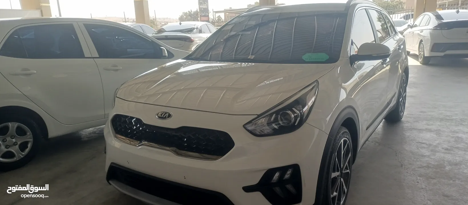 كيا نيرو 2021 جمرك جديد وارد كوري ممشي 32  الف فحص كامل جنطات تورنج