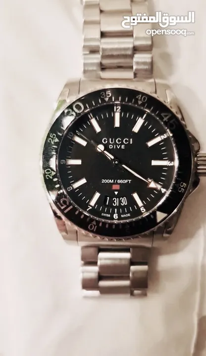 ساعة رجالية   Gucci  YA136301  Men's Dive  Stainless Steel   Chronograph Watch 40mm