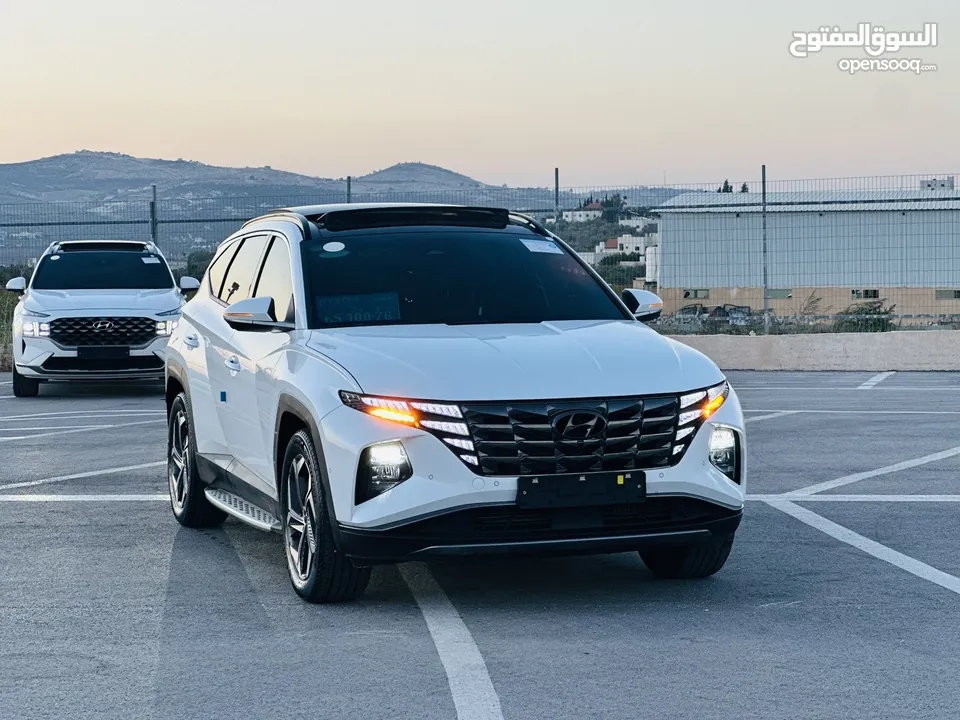 هونداي توسان/2024  فل الفل فتحة سقف بانوراما  2x4 ///240Hp بنزين + كهرباء  ( Haybrid) 1600cc
