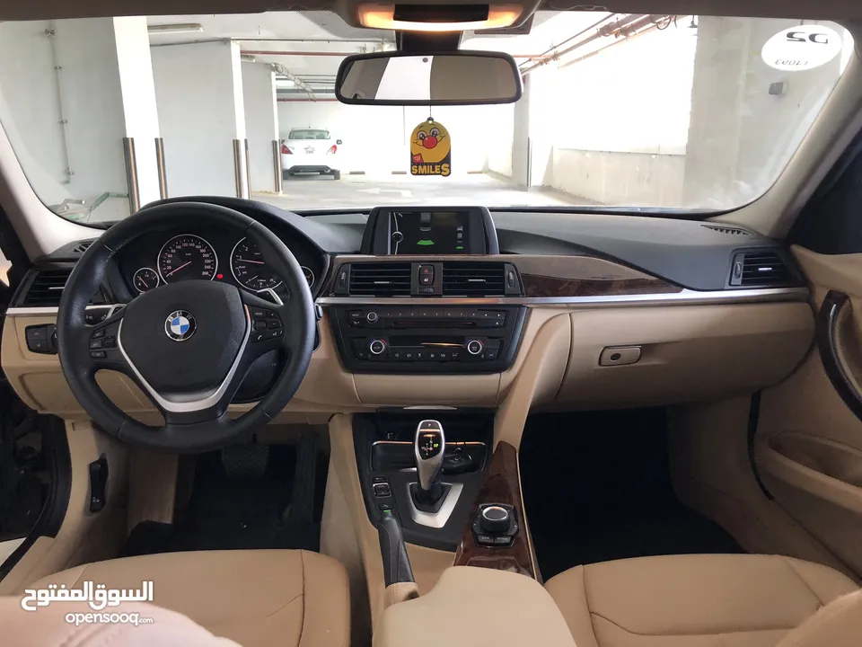 BMW320i 2014 Gcc full opinion without sunroof original paint first owner