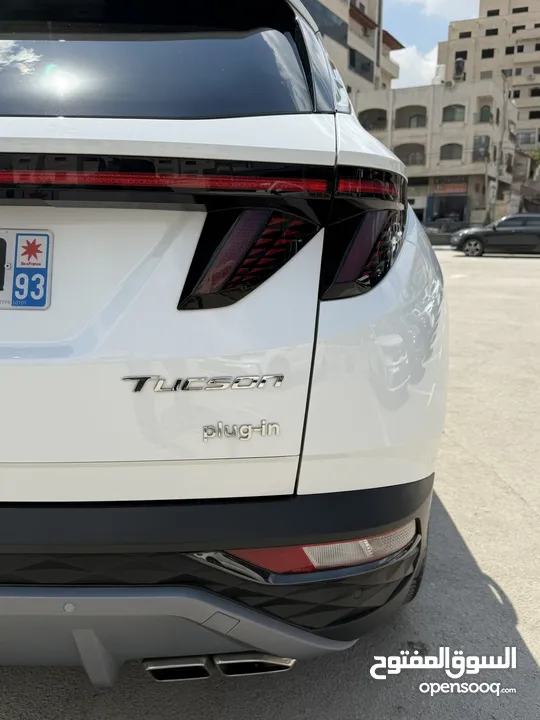هونداي توسان ترخيص 2022 محرك 1600 هايبرد plug in/يقطع على الشحنه 52 كيلو متر