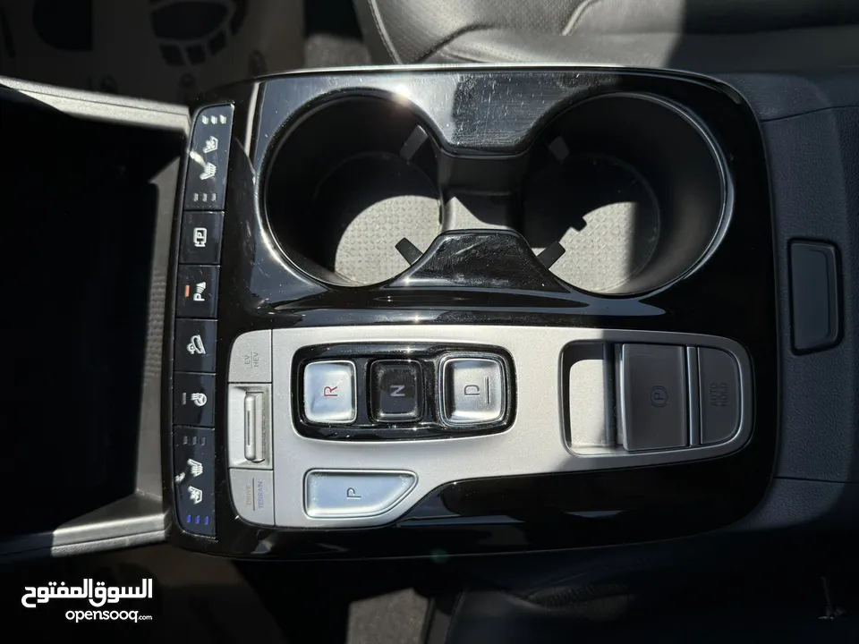 هونداي توسان ترخيص 2022 محرك 1600 هايبرد plug in/يقطع على الشحنه 52 كيلو متر