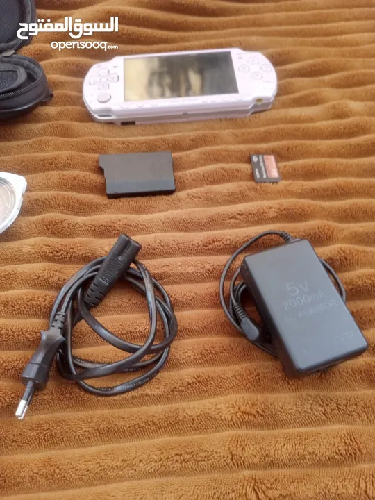 Psp portal لون زهري مع كامل أغراضها