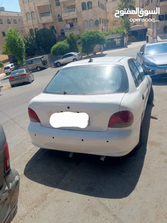 هيونداي اكسنت لون ابيض للبيع خالي قص قلبان والسعر قابل للتفاوش بشيء بسيط