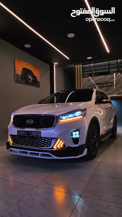 من اجمل كيا سورينتو فل ملغم دفع رباعي بحاله الشركه