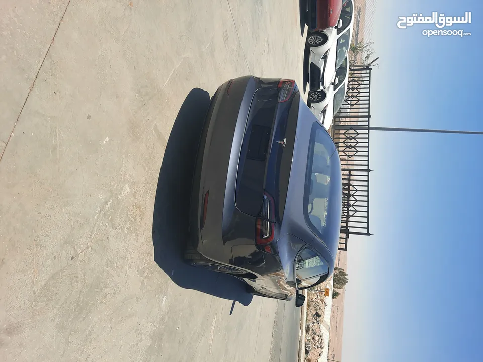 تيسلا موديل 3 موديل 2023 لون فيراني داخل ابيض عداد قليل بسعر مناسب