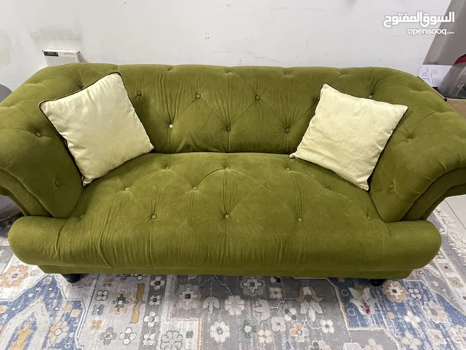 Dark green sofa bought from home centre