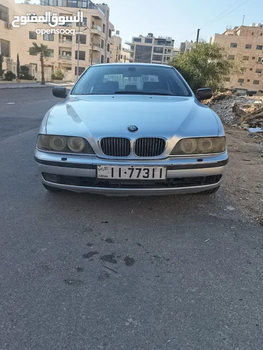 BMW 520 - 4 جيد مع فحص شامل + نمرة رقم مميزة، السيارة full مع فتحة بالسقف- إلا قماش مش  جلد