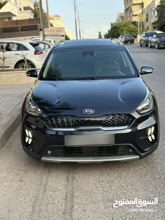 كيا نيرو هايبرد 2020 تورنج فل الفل كاش او اقساط غرفه مميزه لون خمري فتحه