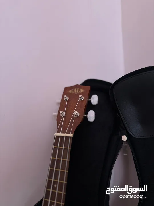 ukulele kala ka-15s يوكيليلي اصلي جديد مع الشنتة نوعية ممتازة جدا اوتار اصلية جديدة نوعية نضيفة