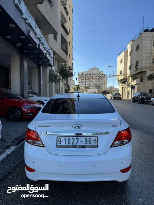 هونداي اكسنت 2015 محرك 1600 ديزل لون ابيض فرش جلد تشغيل بصمه حساسات خلفيه كاميرا خلفيه ترخيص وتامين